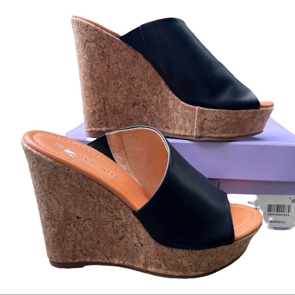 Madden Girl
Nuriel Cork Wedges  
Black
4-1/2" Cork Wedge Heel - Picture 3 of 16